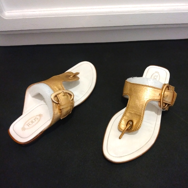 Tods Golden Egyptian Sandals